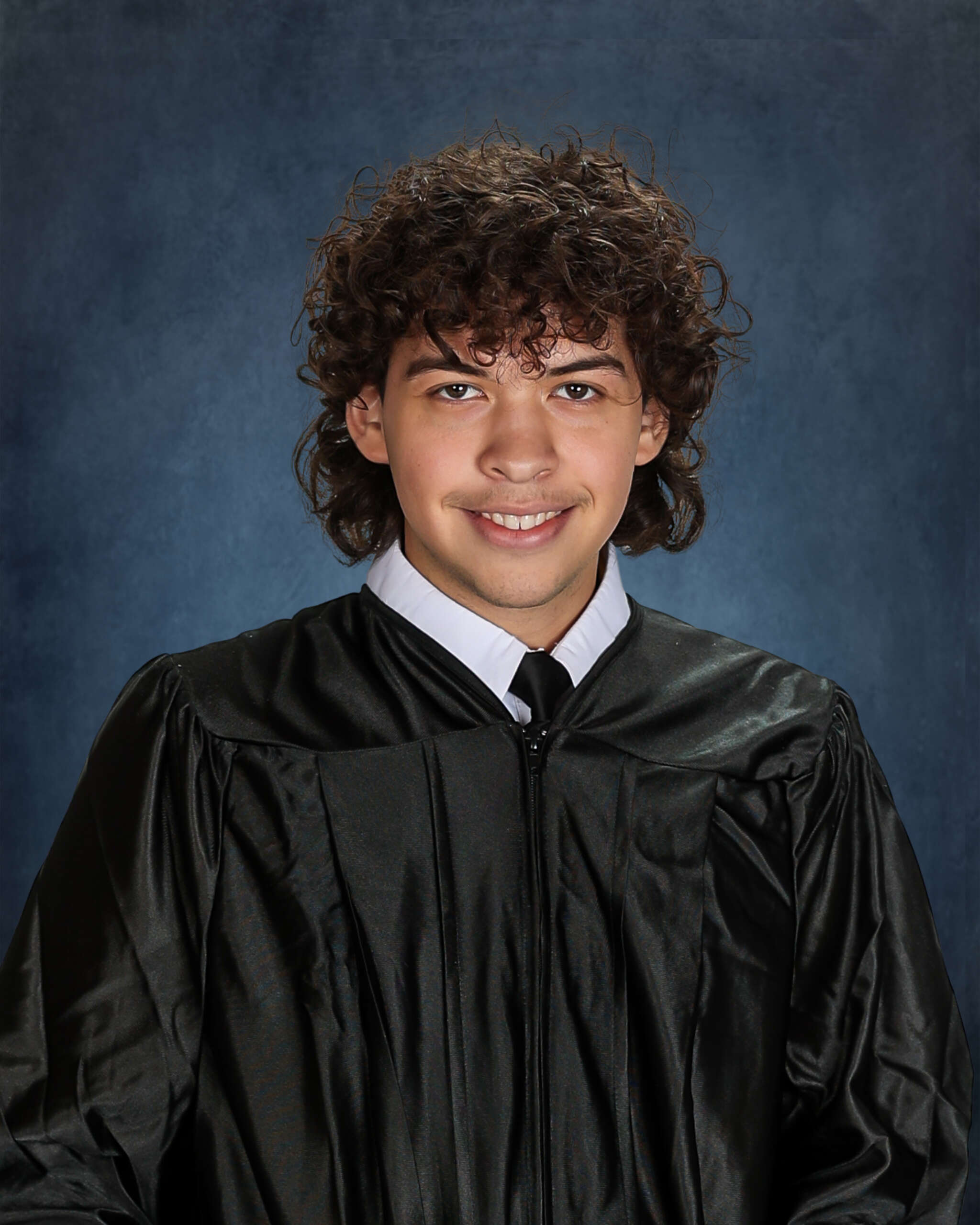 Graduate in cap and gown - KM Fine Photography